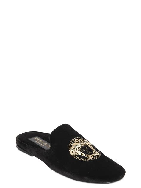 versace black label slippers.